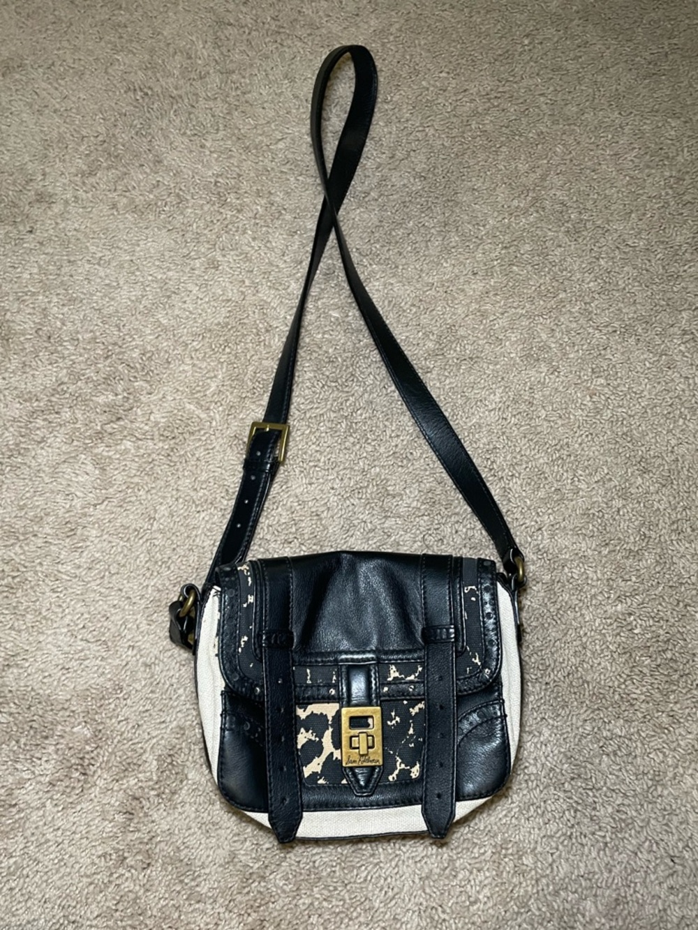 Sam Edelman Small Cecile Crossbody Bag featuring a black and white leopard print
